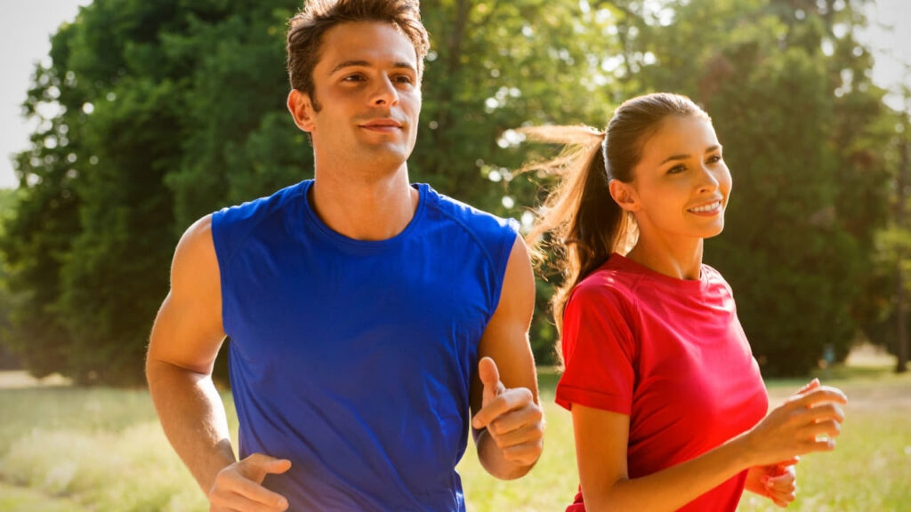 young fit couple out jogging