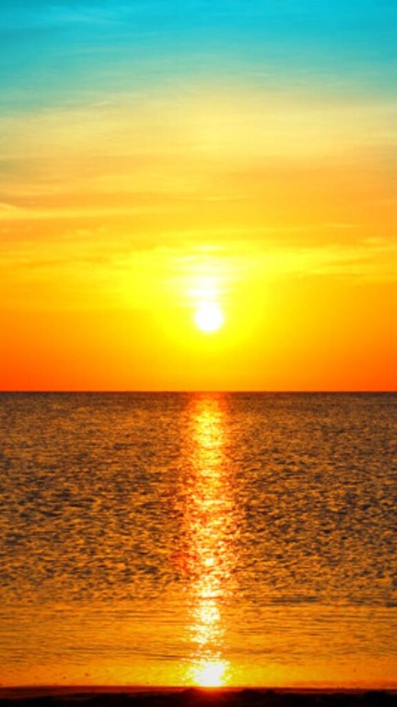 stunning sunrise reflected over the ocean