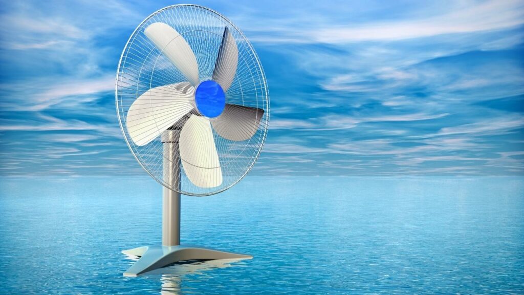 image of electric fan on blue water with blue skies