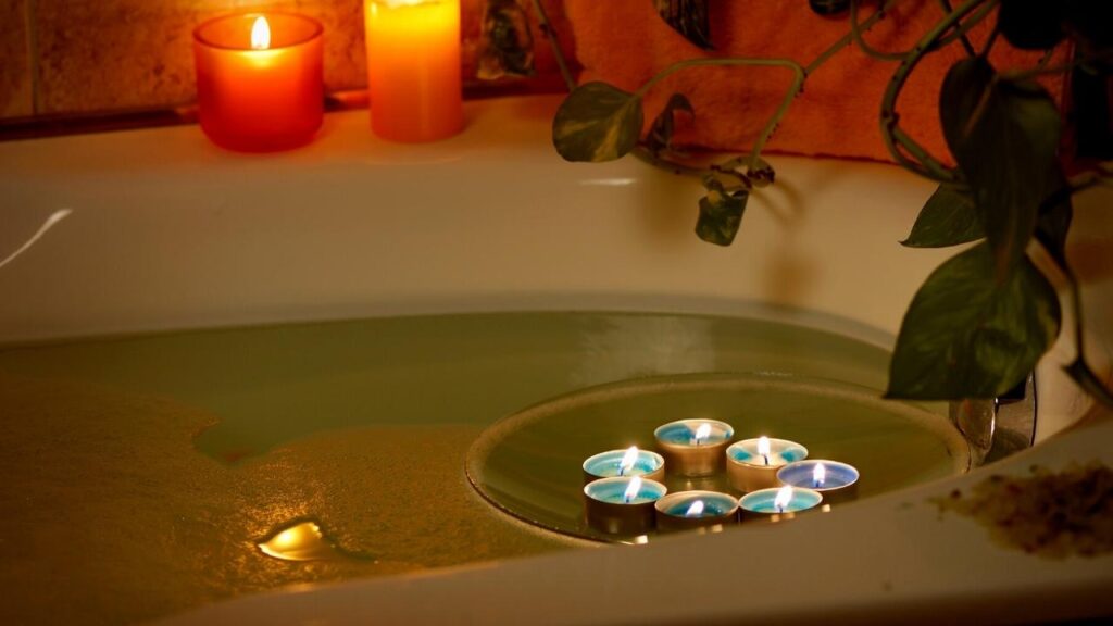 bath water surrounded by candles