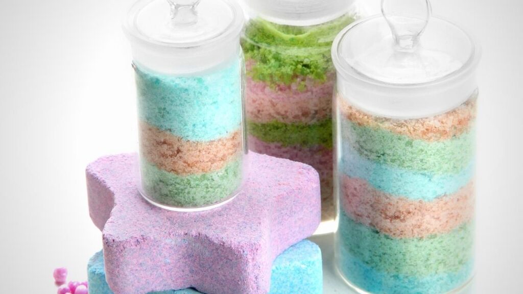 jars of rainbow coloured bath salts