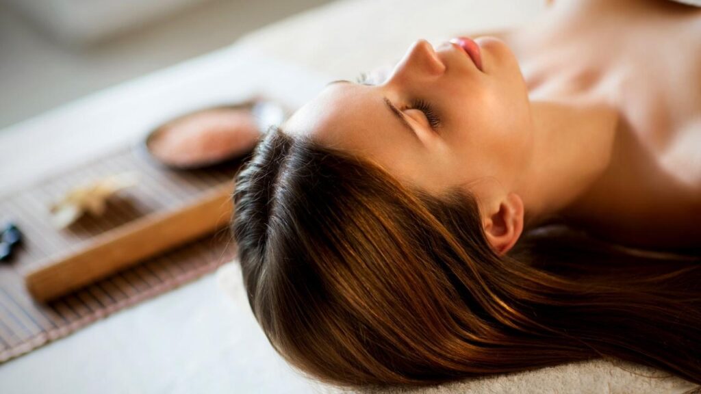 woman relaxing after scalp massage