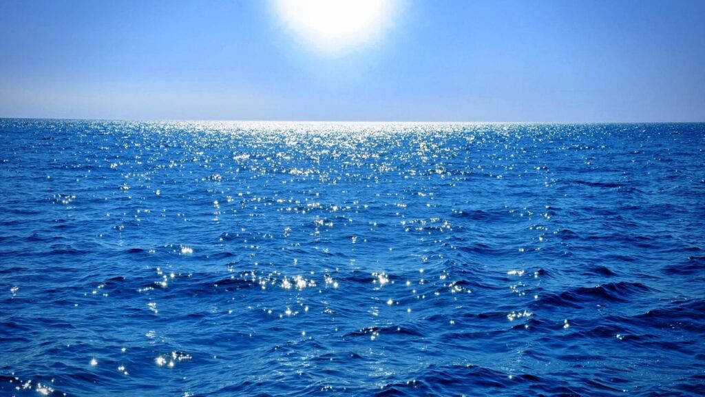 blue sky, white sun and blue seas
