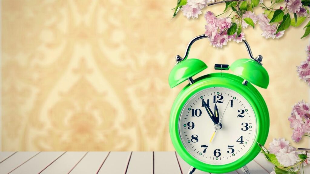 bright green alarm clock on table