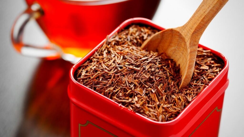 rooibos tea in a red tea caddy