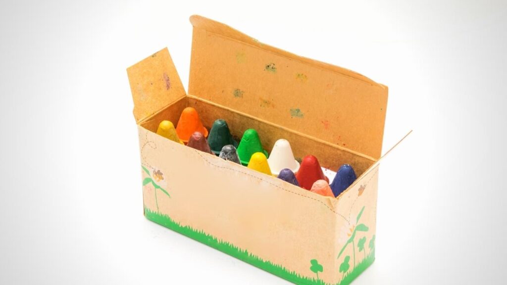 open box of coloured beeswax crayons