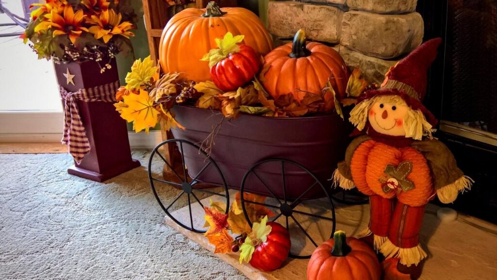 pumpkin and scarecrow display in home