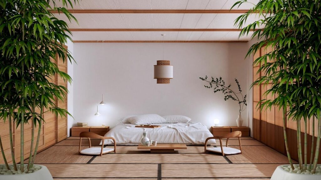 white bed beside bamboo plants