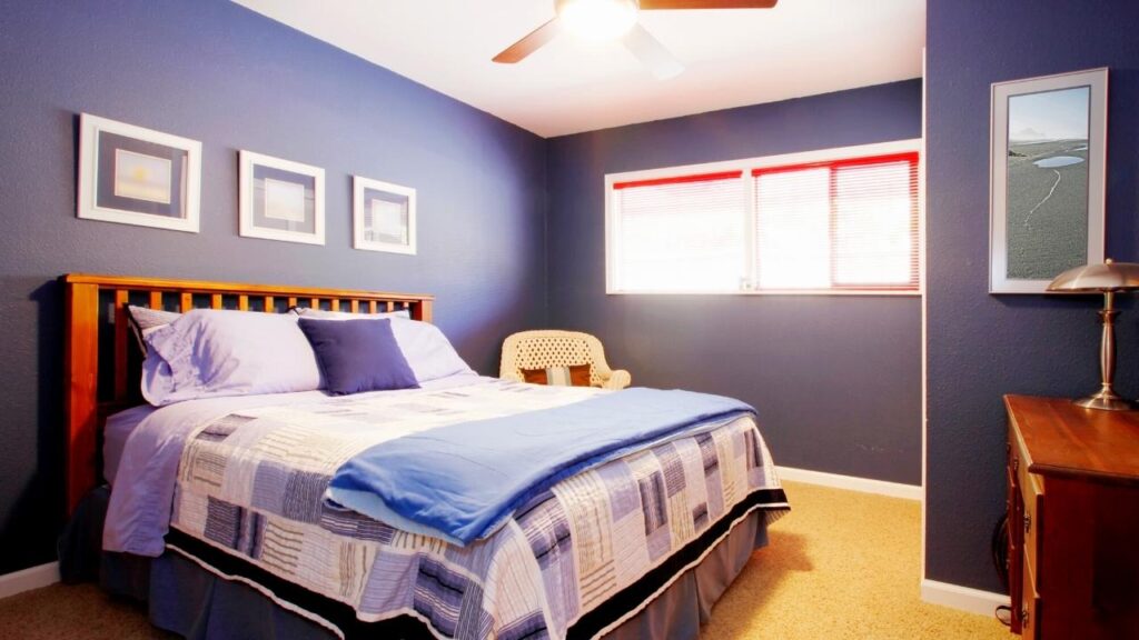 bed with blue checked comforter