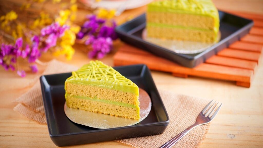 slice of green tea cake on plate